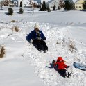 Sliding down Grammy's hill